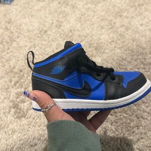 New without box kids Jordan’s Air 1 blue black and white